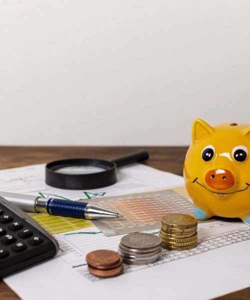 stationery-items-piggy-bank-with-money